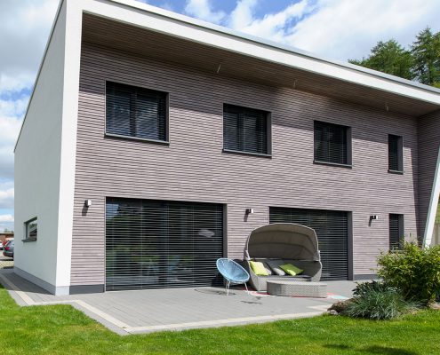Holzrahmenhaus und Carport Bürger