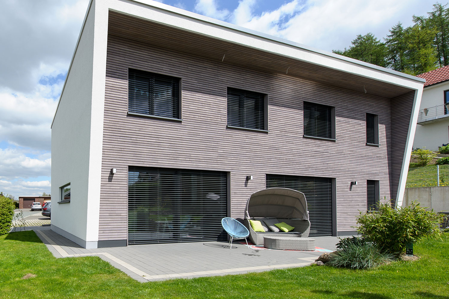 Holzrahmenhaus und Carport Bürger
