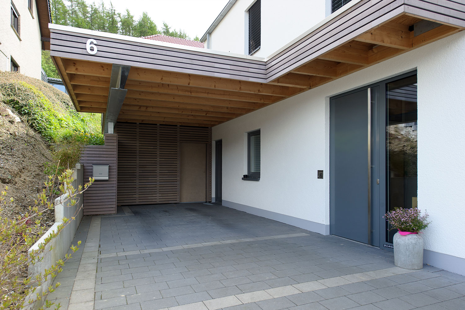 Holzrahmenhaus und Carport Bürger